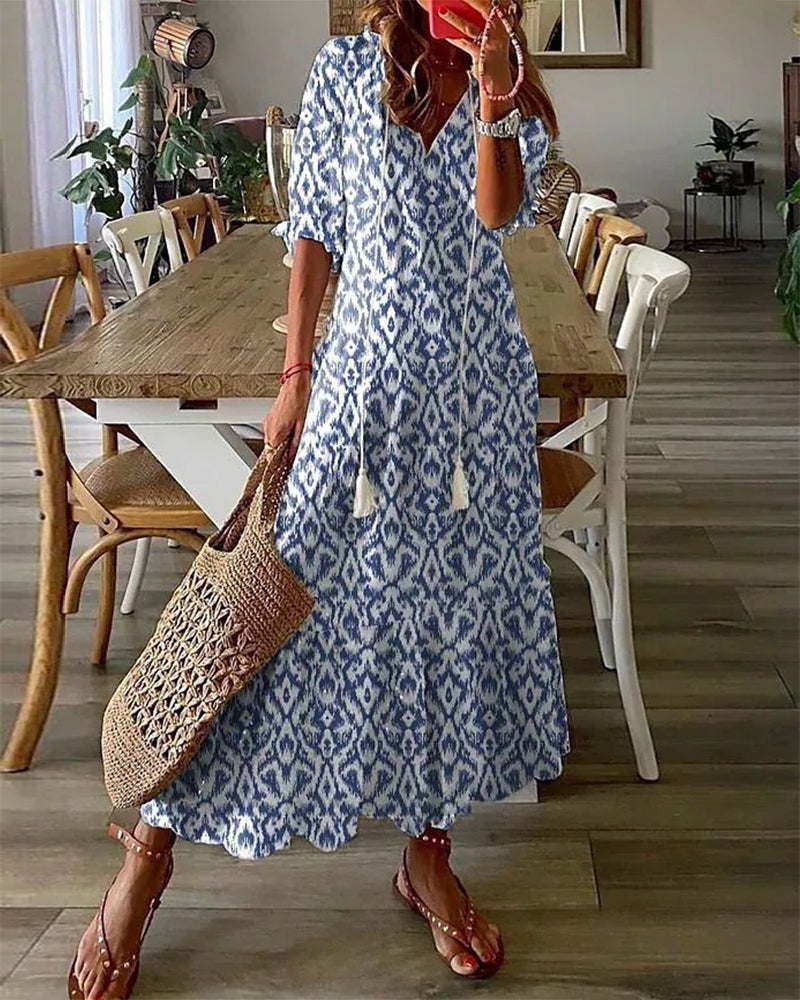 Robe longue bohémienne avec décolleté en V et tombé fluide