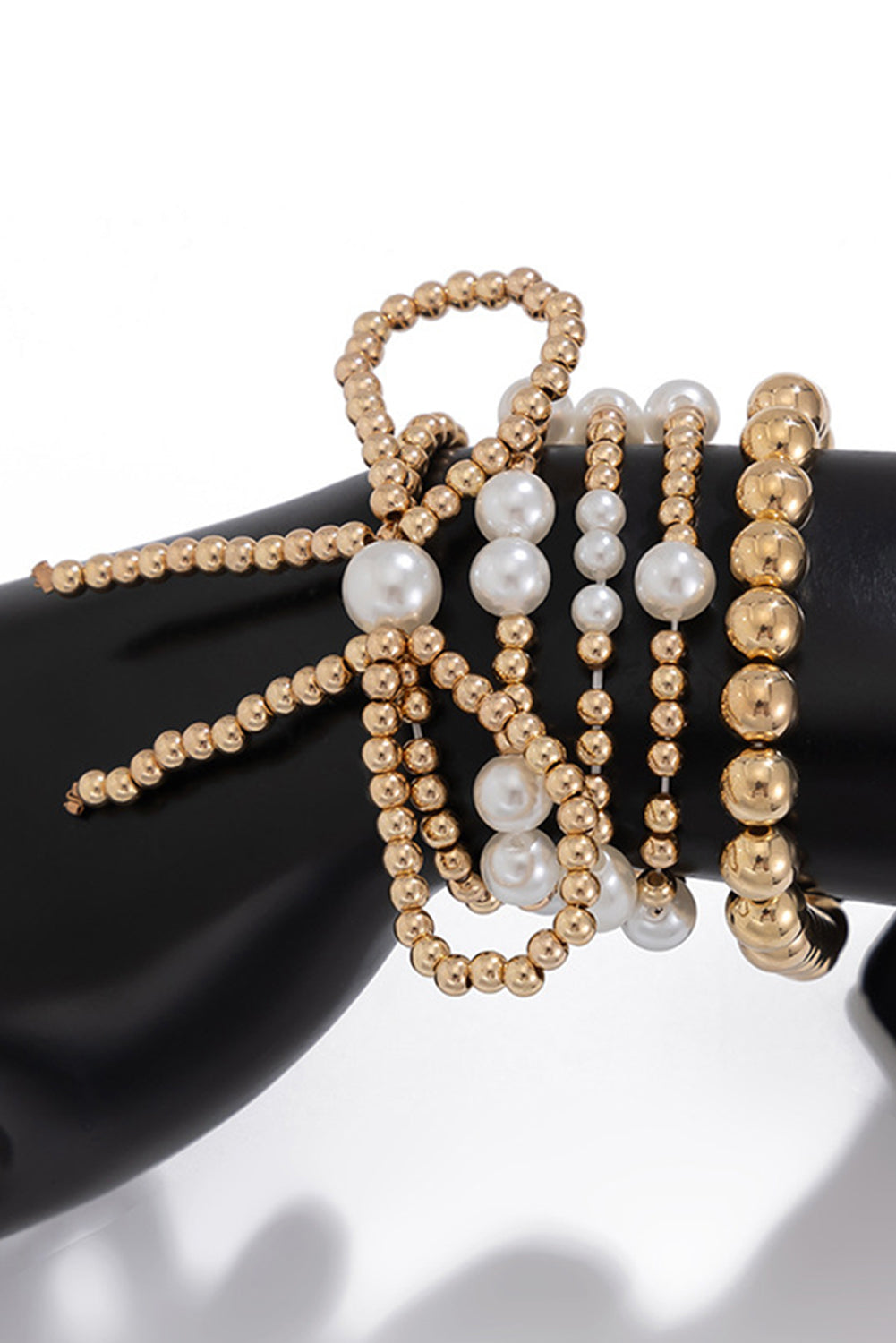 Set di Bracciali Multistrato con Fiocco Dorato e Perle