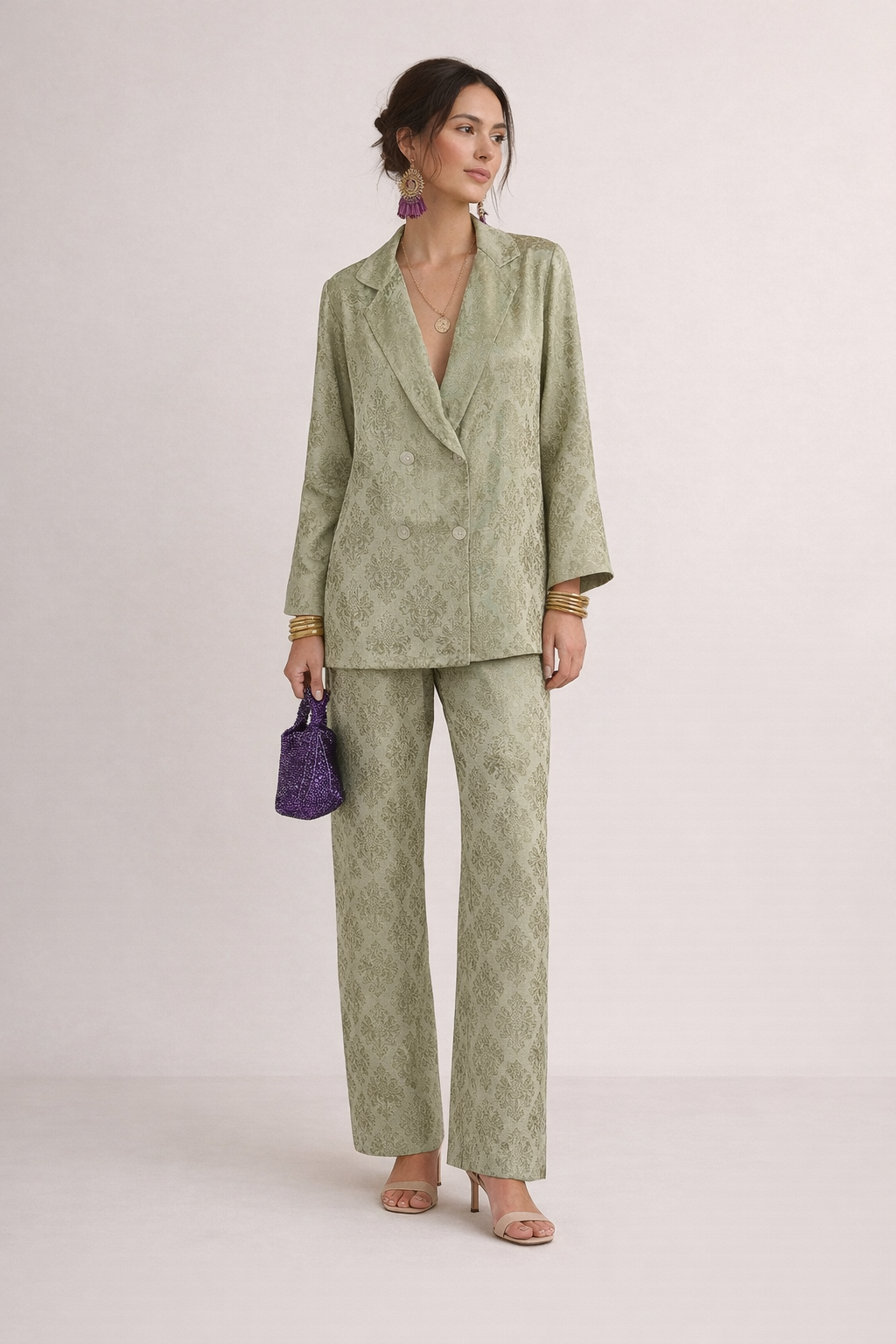 Completo elegante da donna con blazer e pantaloni lunghi a stampa floreale