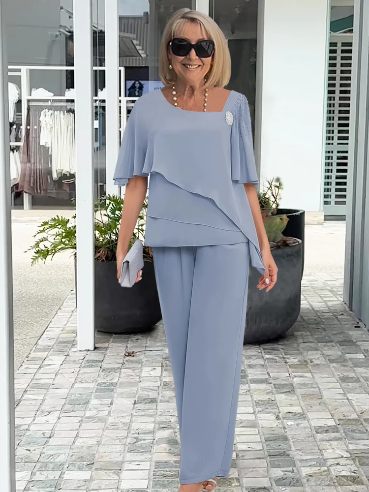 Completo Elegante da Donna con Blusa a Strati e Pantaloni Palazzo