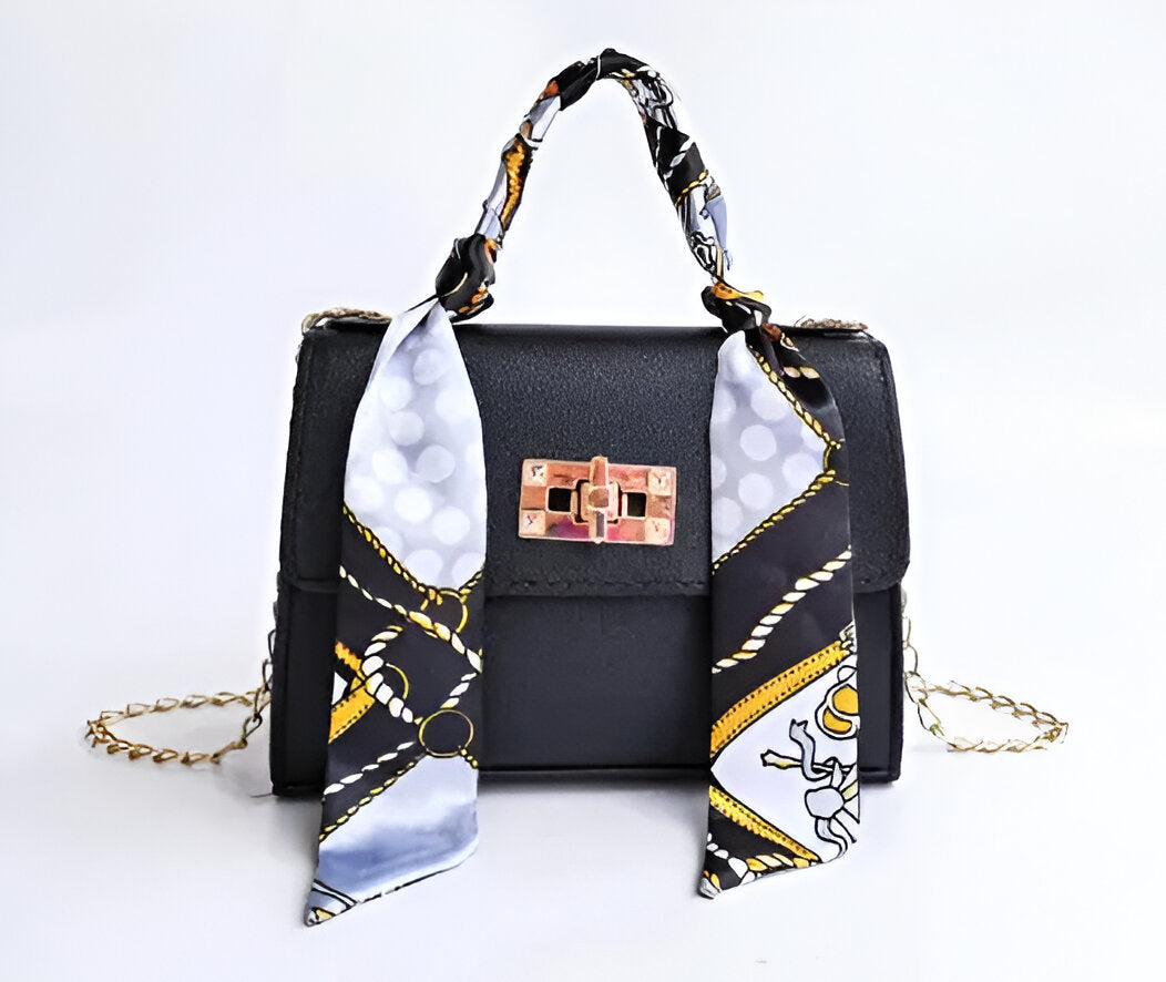 Borsa donna a mano con foulard decorativo e tracolla a catena
