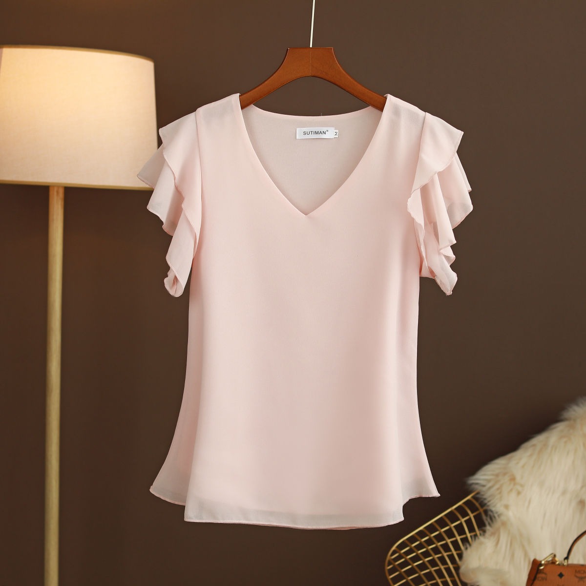 Camicetta leggera in chiffon di seta da donna con maniche a volant e scollo a V