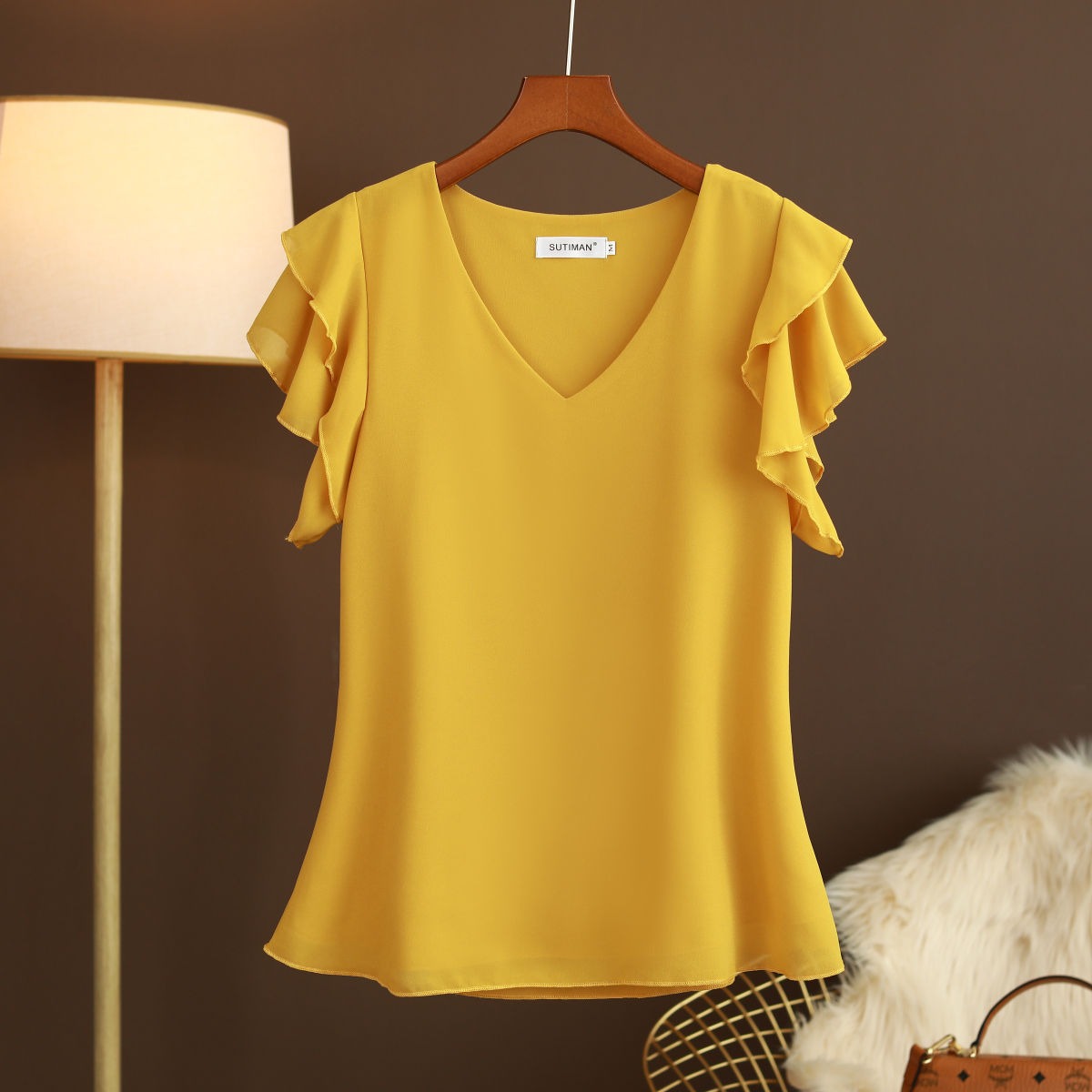 Camicetta leggera in chiffon di seta da donna con maniche a volant e scollo a V