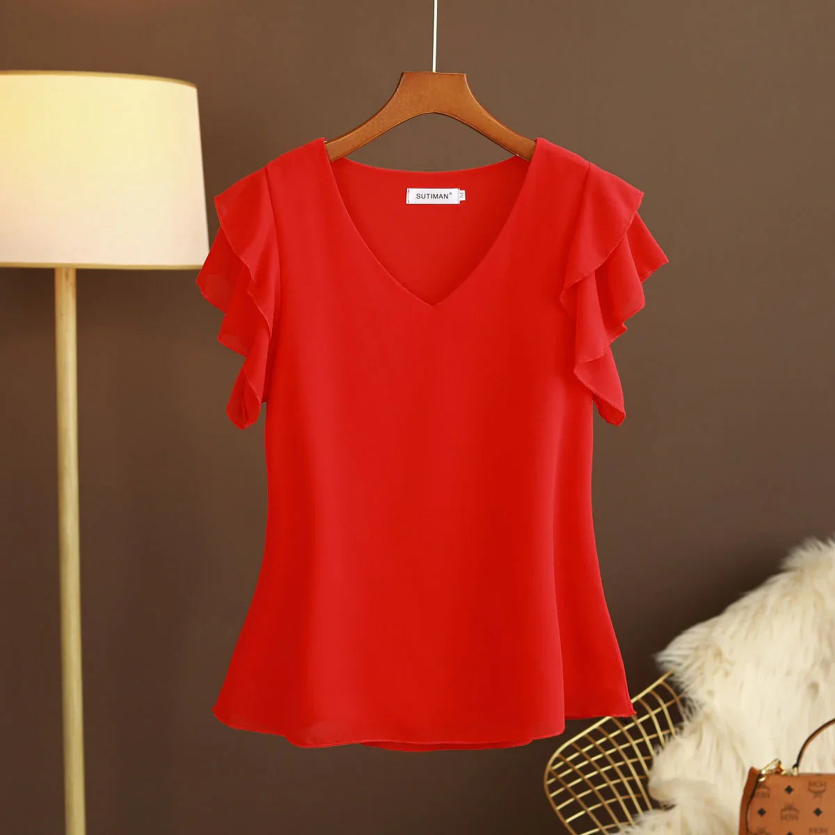 Camicetta leggera in chiffon di seta da donna con maniche a volant e scollo a V