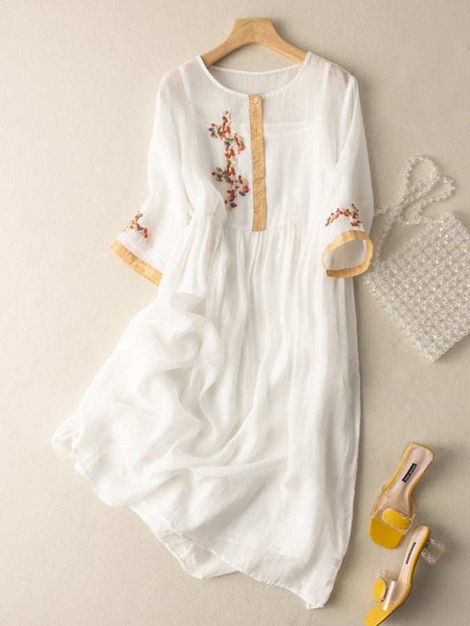 Vestido bordado de algodón y lino con diseño étnico y ajuste cómodo