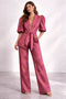 Elegante completo da donna con maniche a sbuffo