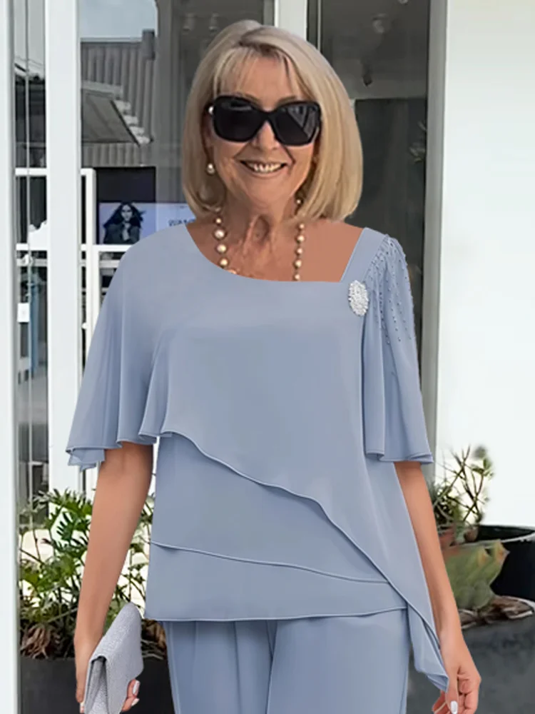 Completo Elegante da Donna con Blusa a Strati e Pantaloni Palazzo