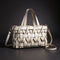Borsa a mano intrecciata Camille