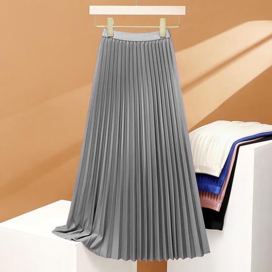 Gonna lunga plissettata elasticizzata a vita alta, elegante e confortevole, perfetta per un look sofisticato e femminile.