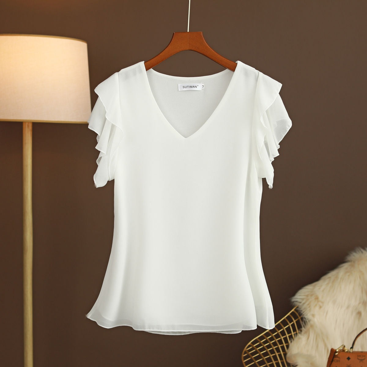 Camicetta leggera in chiffon di seta da donna con maniche a volant e scollo a V
