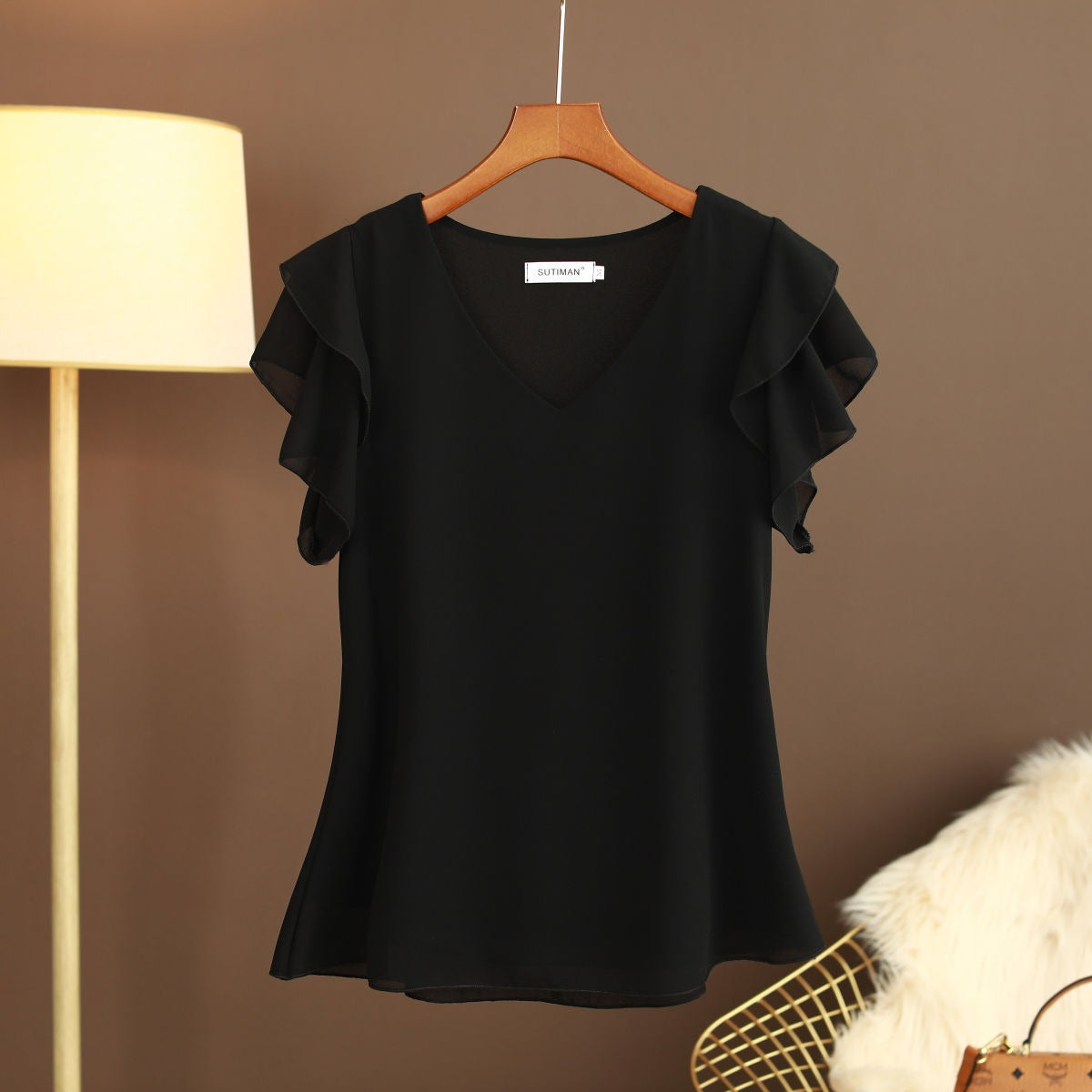 Camicetta leggera in chiffon di seta da donna con maniche a volant e scollo a V
